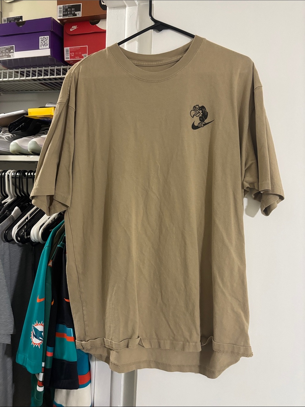 Nike Men's Tan Short Sleeve Crewneck T-Shirt with Black Logo